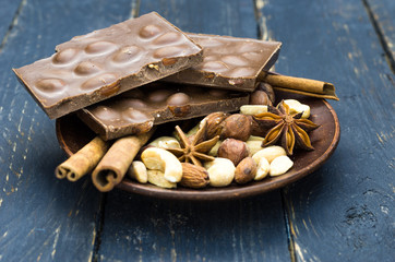 Saucer with sweets in the center of the table.