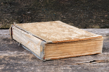 An old shabby book. Front view.