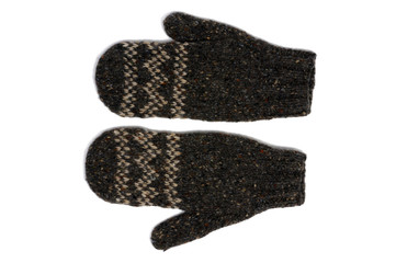 Gray knitted mittens on a white background. View from above.