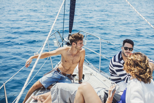 Group of Friends Enjoying on Yacht