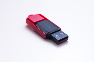 USB flash drive key isolated on white. Portable flash drive memory isolated on white.
