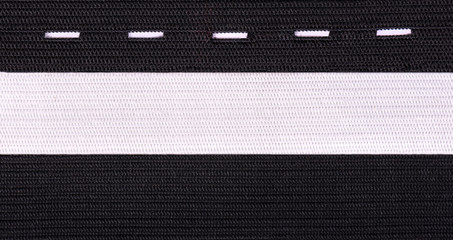 Black and white sewing elastic band isolated on white background. A variety of elastic bands for...