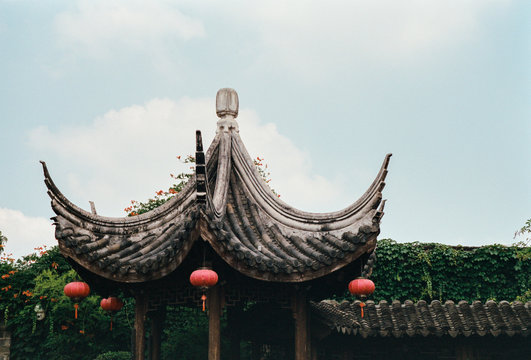 Red lanterns decorations at fuzimiao Temple against sky