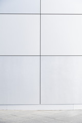 modern minimalistic geometric wall of metal or plastic square blocks