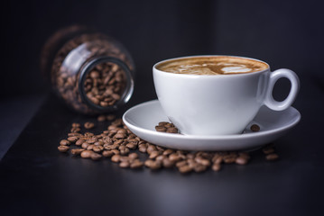 Coffee Cup and Beans on Wooden Table