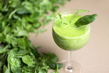 Green, detox, vegetable juice with spinach, wild rocket, avocado and lettuce. Healthy smoothie.