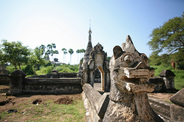 Ancient animals keep watch over derelict stone buildings in Bagan, Myanmar