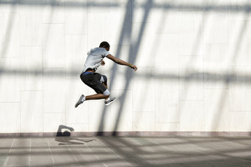 Man jumping above ground