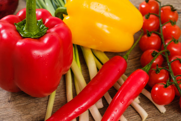 Ingredients vegetables for Burritos, tomatoes and peppers on wooden background. Top view