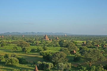 Fototapeta na wymiar The view from the shwesandaw pagoda across the temple fields of Bagan in Burma