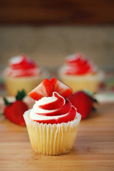 Strawberry Cupcake photographed with a shallow depth of field.