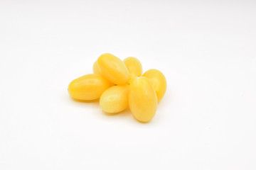 Tiny grape tomatoes in red, orange, yellow, and purple. 