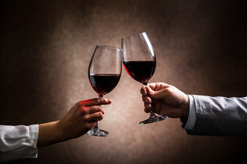 Naklejka na ściany i meble toasting with wine glasses