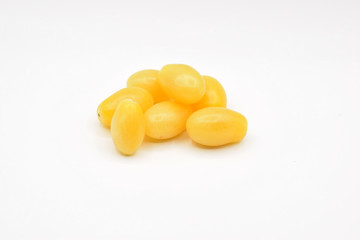 Tiny grape tomatoes in red, orange, yellow, and purple. 