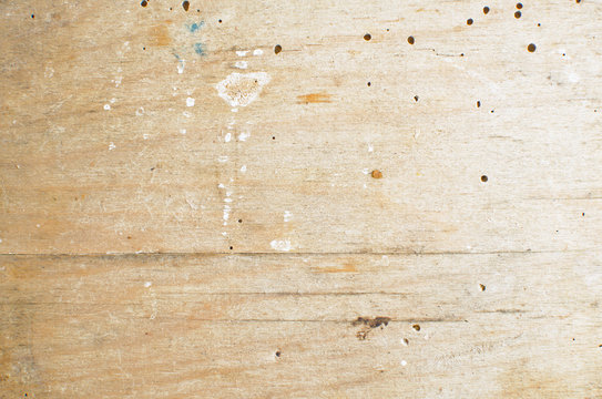 old plywood gnawed by beetles wood borers background or texture