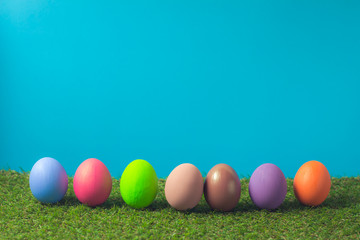 Easter eggs on the green grass.