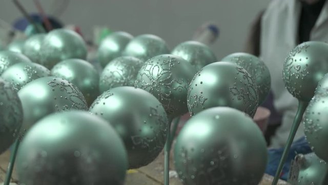 Close up of green glass tree ornaments