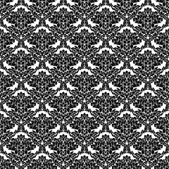 Damask seamless pattern intricate design. Luxury royal ornament, victorian texture for wallpapers, textile, wrapping. Exquisite floral baroque lacy flourish in black and white monochrome colors