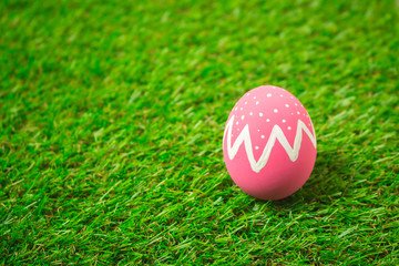 Easter eggs on the green grass.