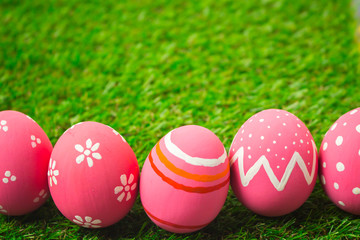 Easter eggs on the green grass.