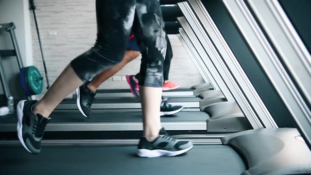 the scene of legs moving on the treadmill