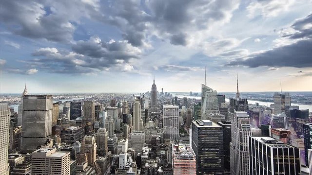 Manhattan cityscape timelapse day to night with Empire State Building and landmark skyscrapers and buildings 4K and 1080 HD