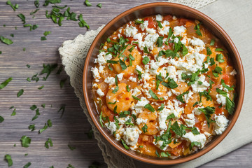 National Greek dish saganaki with shrimps. Close up. The view from the top. Copy-space.