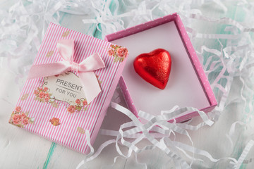 beautiful miniature striped gift box with lettering and bow
