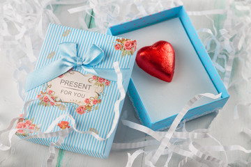 beautiful miniature striped gift box with lettering and bow