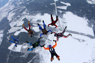 SKydivers in the sky.