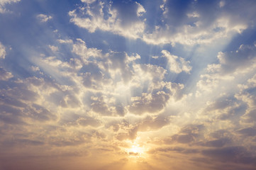 Cloudy Sunrise with Light beams