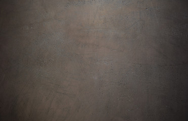 Beige grunge texture background. Light brown colored concrete wall. Abstract glossy grunge plaster...
