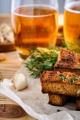 two glasses of beer and snacks