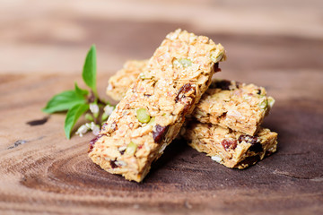 Snack bar or energy bar on wooden background