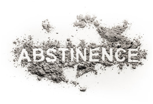 Abstinence word written in ash, sand or dust