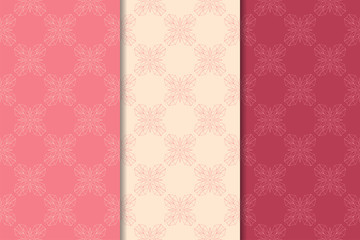 Set of red floral ornaments. Cherry pink vertical seamless patterns