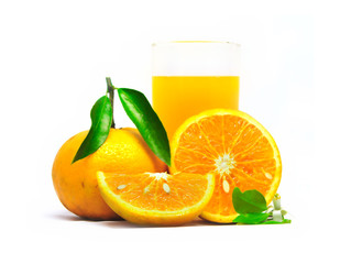 Glass of fresh orange juice with slices of oranges and fruits, isolated on white background
