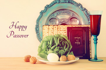 Pesah celebration concept (jewish Passover holiday). Traditional book with text in hebrew: Passover Haggadah (Passover Tale).