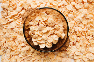 delicious crispy cornflakes in bowl,  healthy breakfast