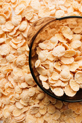 delicious crispy cornflakes in bowl,  healthy breakfast