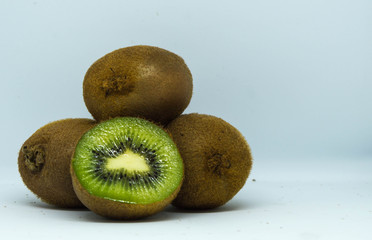 Fresh kiwi in front of white background