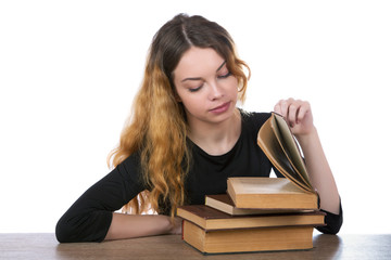 girl looking into the book on a white background