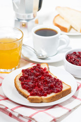 toast with cranberry jam for breakfast, vertical