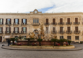 Fototapeta na wymiar The fountain of Artemide in Syracuse, Sicily, Italy