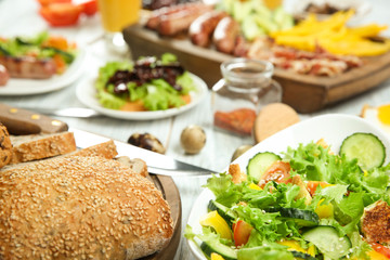 Delicious breakfast served on table