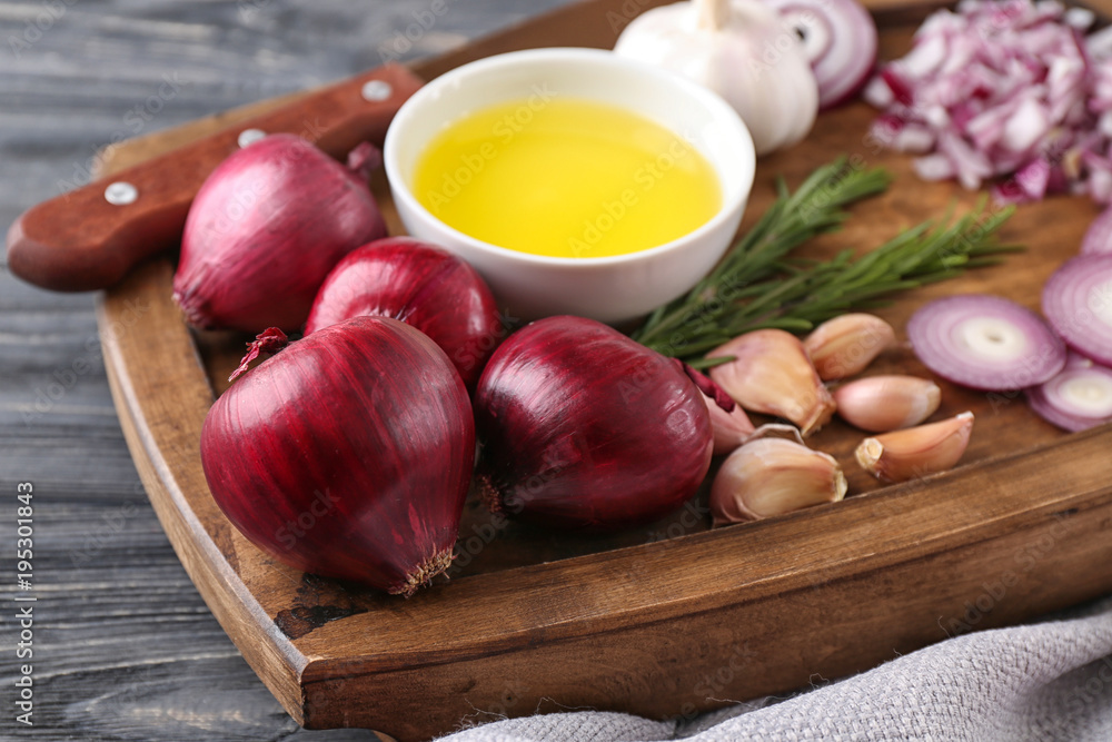 Canvas Prints red onion with garlic on wooden board