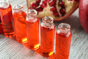Bottles of perfume oil on table
