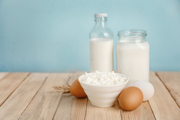 Obraz na płótnie Canvas Fresh dairy products and eggs on table