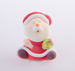 Santa Claus figurine on background