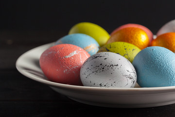 Happy easter! Easter eggs on wooden background